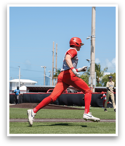 A baseball player running on the field. Description generated by AI