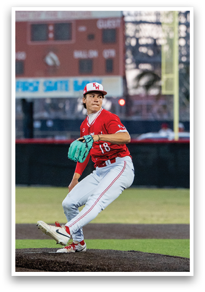 A baseball player is swinging a bat at a ball. Description generated by AI