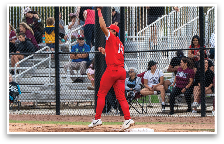 A person wearing a red shirt and red pants is throwing a baseball. Description generated by AI