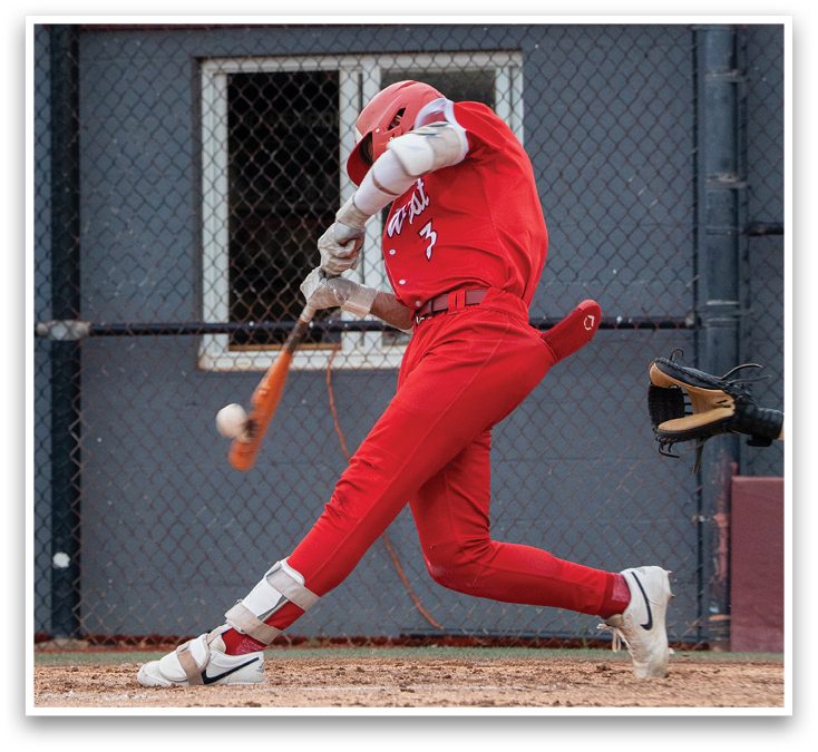 A baseball player in a red jersey is swinging a bat. Description generated by AI