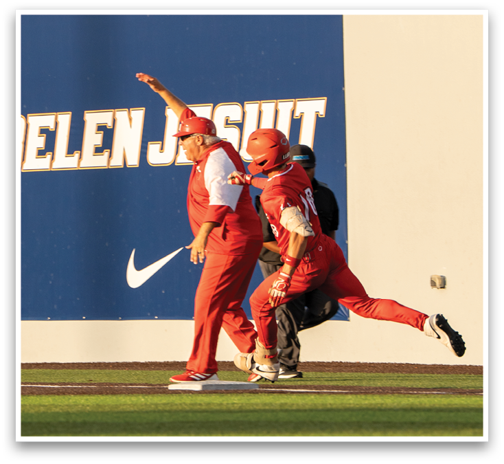A baseball player is sliding into home plate. Description generated by AI