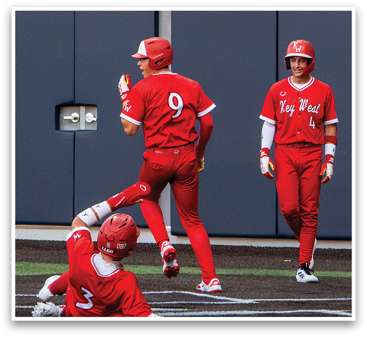 A baseball player slides into home base. Description generated by AI