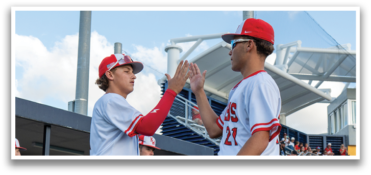 Two baseball players shaking hands. Description generated by AI