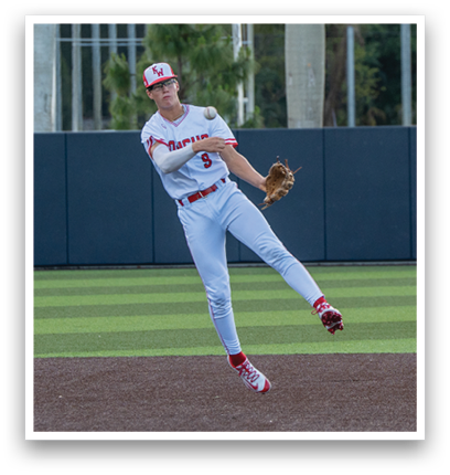 A baseball player in a red and white uniform is throwing a ball. Description generated by AI