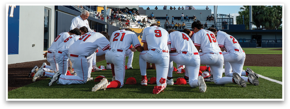 Baseball players on a field. Description generated by AI