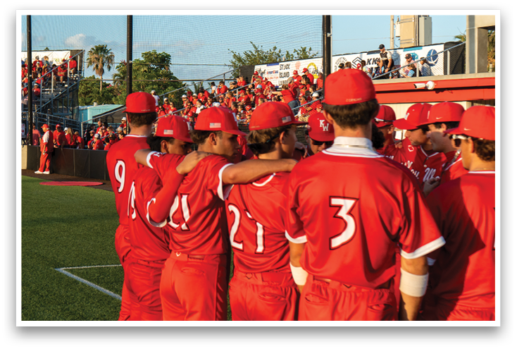 Baseball players wearing red uniforms. Description generated by AI