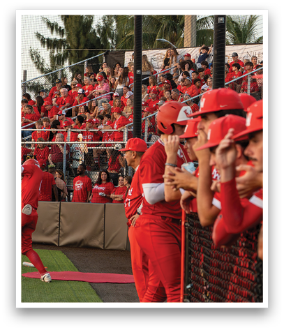 A baseball game is being played in front of a crowd of people. Description generated by AI