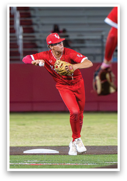 A baseball player in a red uniform is throwing a ball. Description generated by AI