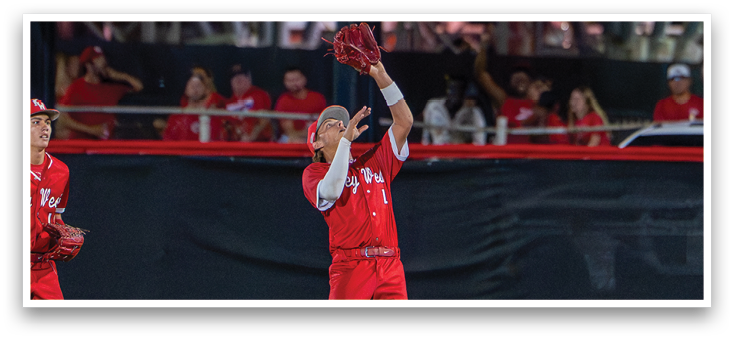 A baseball player catching a ball. Description generated by AI