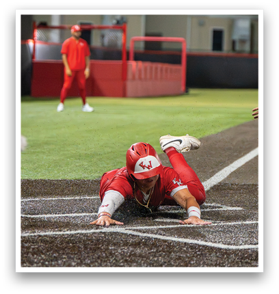 A baseball player slides into home base. Description generated by AI