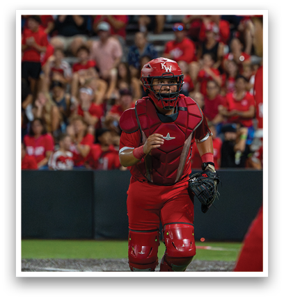 A baseball player wearing a red uniform and a catcher's mitt. Description generated by AI