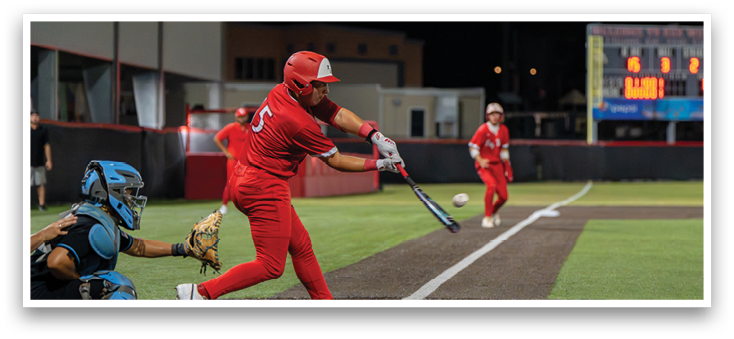 A baseball player in a red uniform is swinging a bat. Description generated by AI