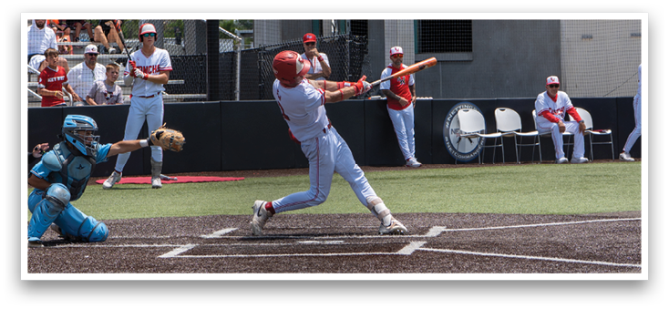 A baseball player is swinging a bat at a ball. Description generated by AI
