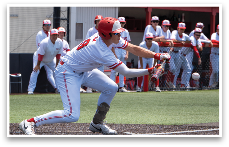 A baseball player is swinging a bat at a ball. Description generated by AI