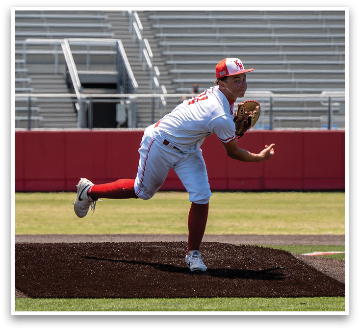 A baseball player in a red and white uniform is pitching a ball. Description generated by AI