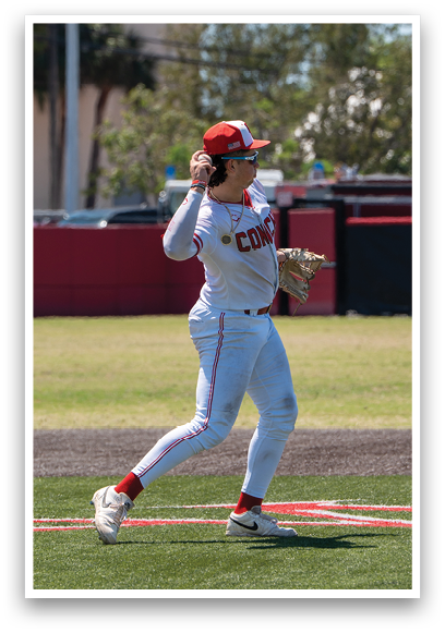 A baseball player in a white uniform is throwing a ball. Description generated by AI