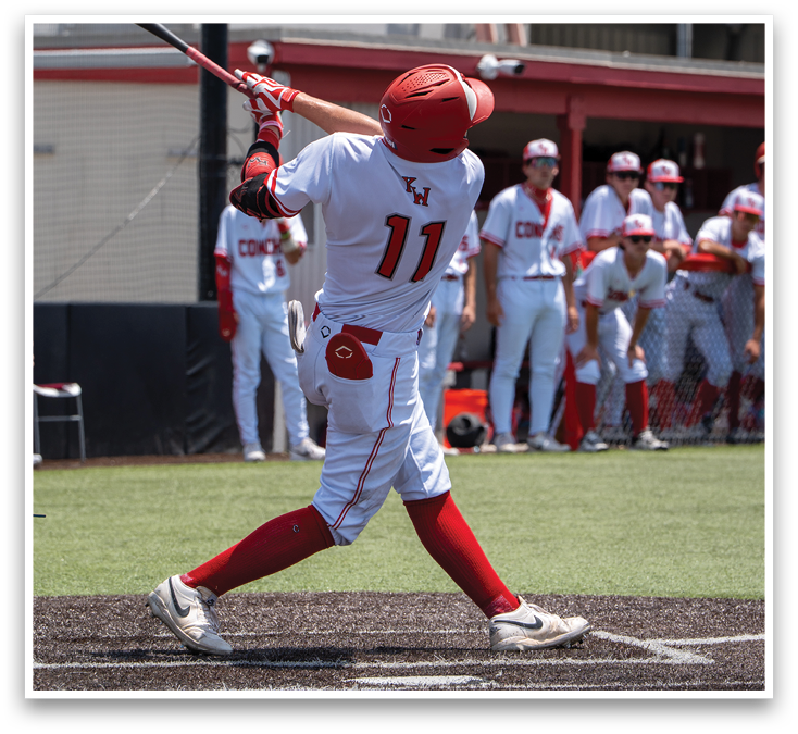 A baseball player in a white and red uniform is swinging a bat. Description generated by AI
