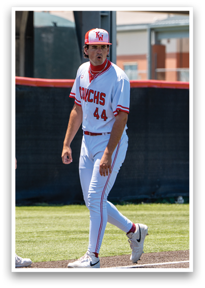 A baseball player wearing a red and white uniform. Description generated by AI