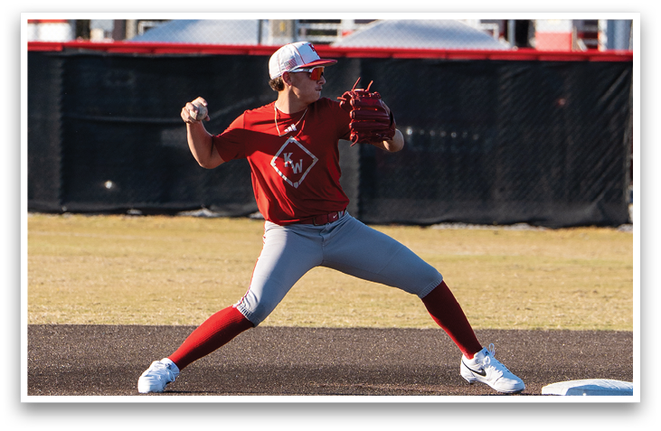 A baseball player in a red shirt and grey pants is in the process of throwing a ball. AI generated content