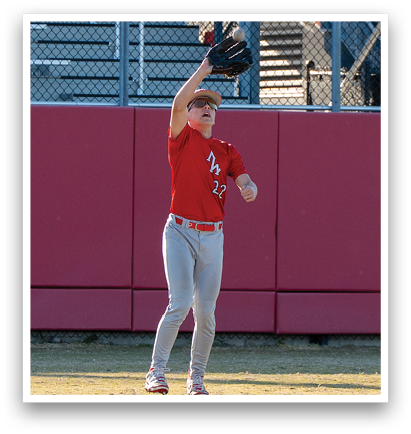 A baseball player in a red shirt and grey pants catching a ball. AI generated content