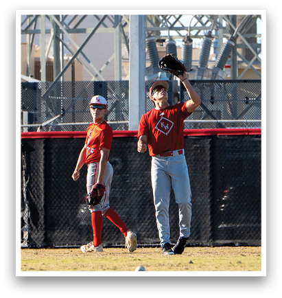 Two young men playing baseball, one catching a ball in a glove and the other running. AI generated content
