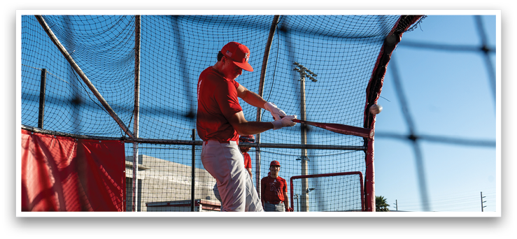 A baseball player in a red shirt and white pants is swinging a bat at a ball. AI generated content