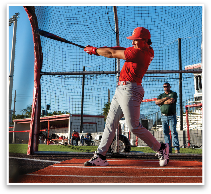 A baseball player is swinging a bat in a batting cage. AI generated content