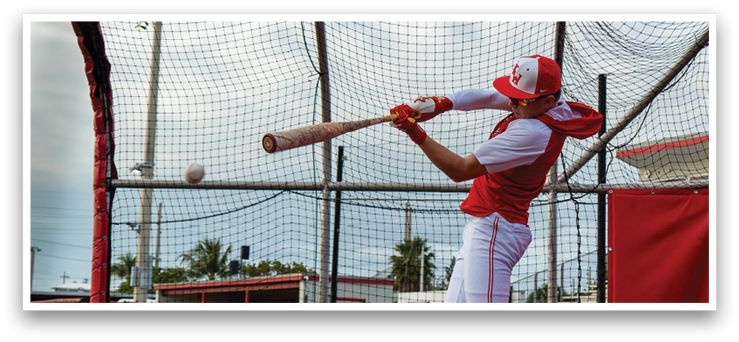 A baseball player in a red and white uniform is swinging a bat at a ball. AI generated content
