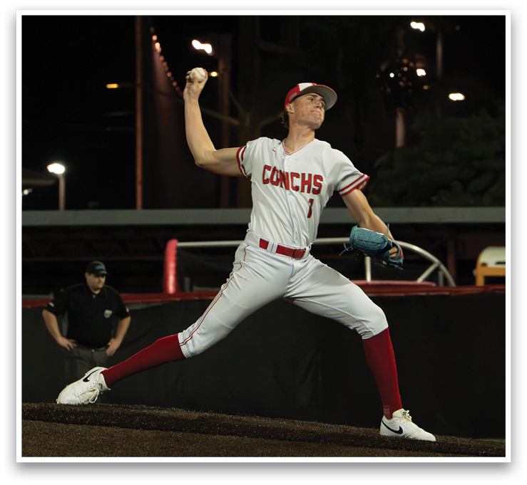 A baseball player in a white uniform is pitching a ball on a field. AI generated content