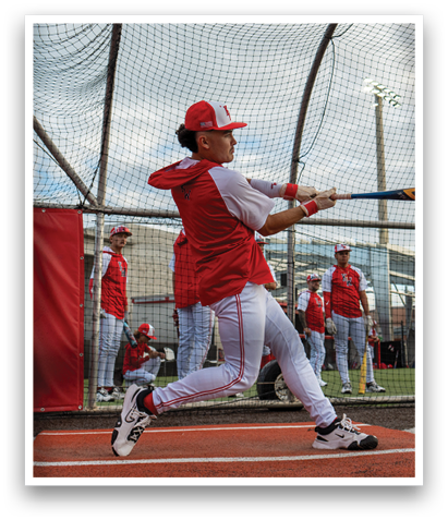 A baseball player in a red and white uniform is swinging a bat at a ball. AI generated content