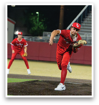 A baseball player in a red uniform is pitching a ball. AI generated content