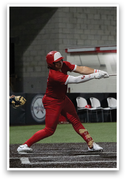 A baseball player in a red uniform is swinging a bat at a ball. AI generated content