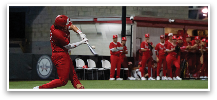 A baseball player in a red uniform is swinging a bat at a ball. AI generated content