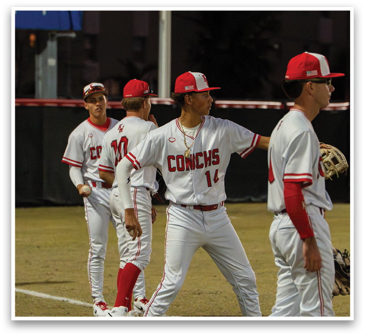 A group of baseball players wearing white uniforms and red caps. AI generated content