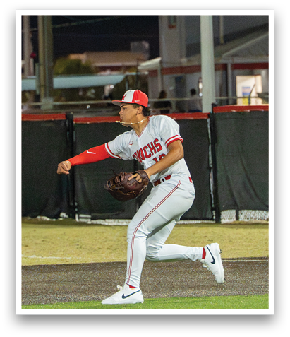 A baseball player in a grey and red uniform is running on the field, holding a baseball glove. AI generated content