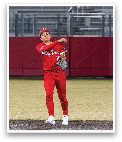 A baseball player in a red uniform is throwing a ball. AI generated content