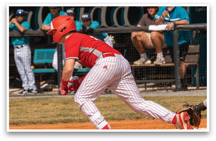 A baseball player in a red helmet and white uniform is running towards home plate. AI generated content