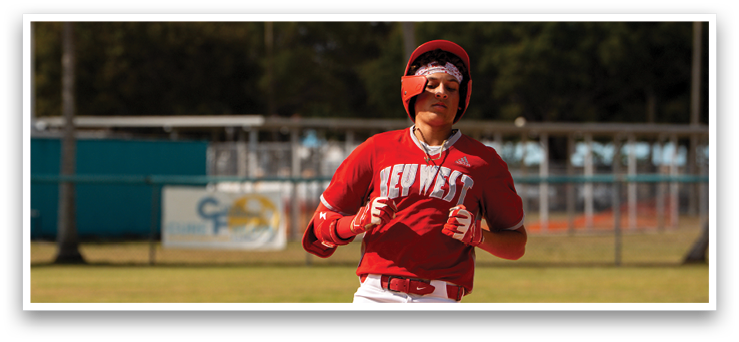 A baseball player in a red shirt and white pants is running towards a base. AI generated content