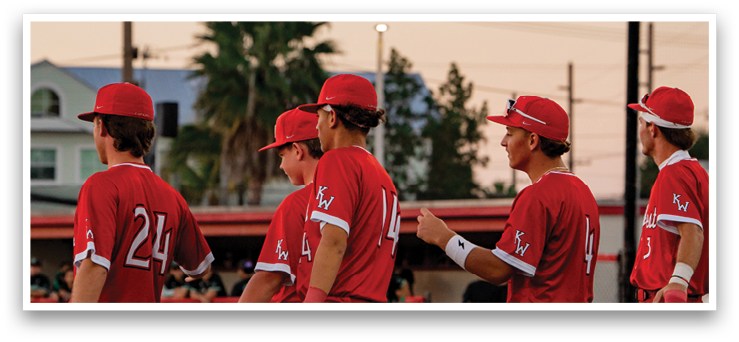 A group of baseball players wearing red uniforms are walking on the field. AI generated content