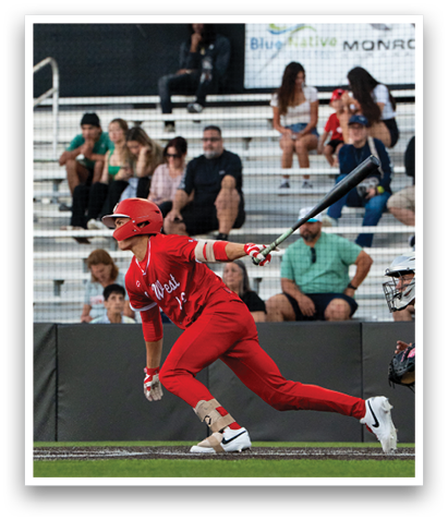 A baseball player in a red uniform is swinging a bat, while a crowd of people watch from the stands. AI generated content