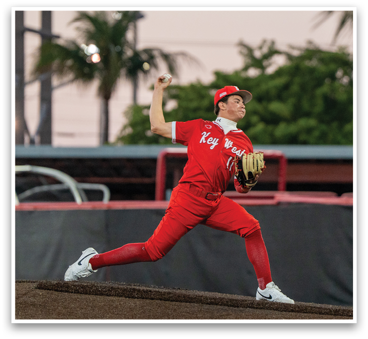 A baseball player in a red uniform is pitching a ball. AI generated content