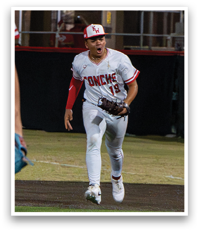 A baseball player wearing a white uniform is running on the field. AI generated content