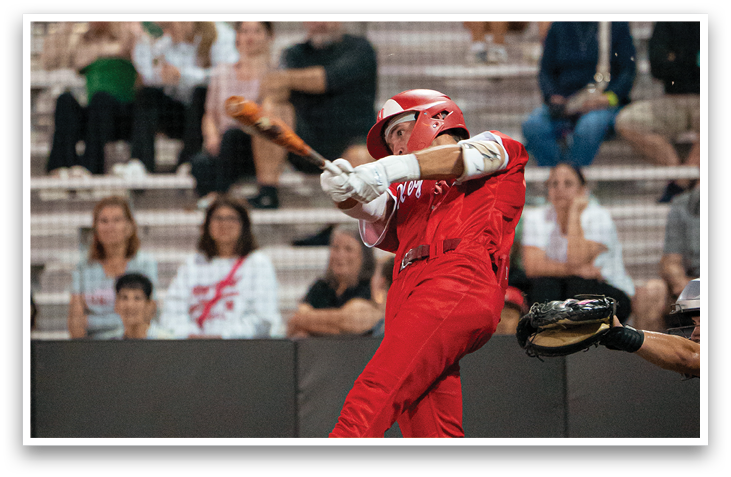 A baseball player in a red uniform is swinging a bat, with a crowd of people watching. AI generated content