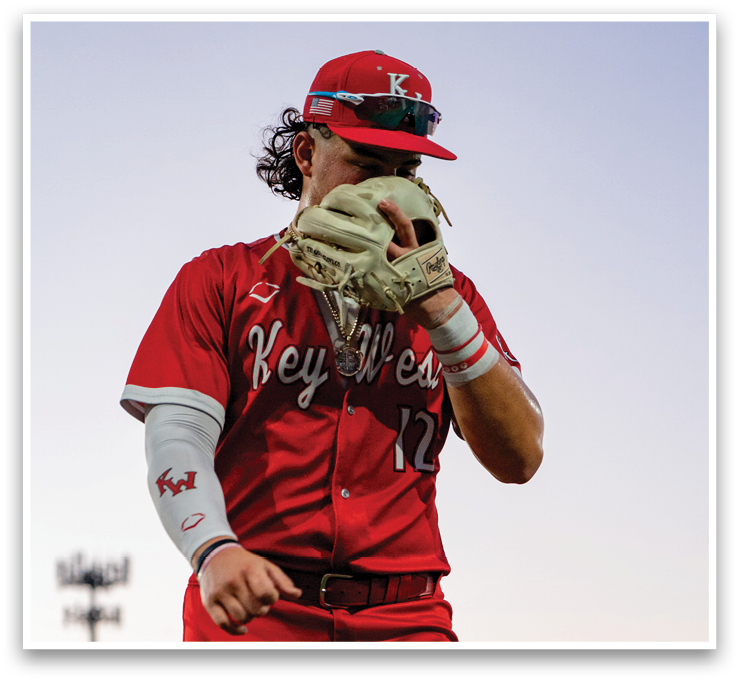 A baseball player wearing a red uniform and a white glove is running on the field. AI generated content