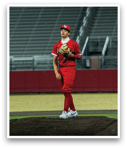 A baseball player in a red uniform stands on a pitcher's mound, holding a baseball glove. AI generated content