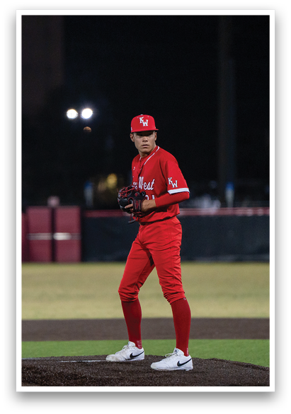 A baseball player in a red uniform stands on the pitcher's mound, holding a baseball glove. AI generated content