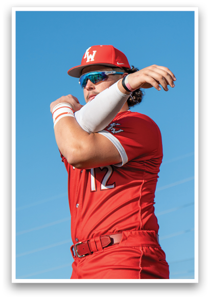 A baseball player in a red uniform is swinging a bat. AI generated content