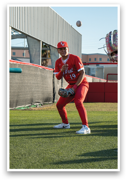 A young boy is watching a man throw a baseball. AI generated content