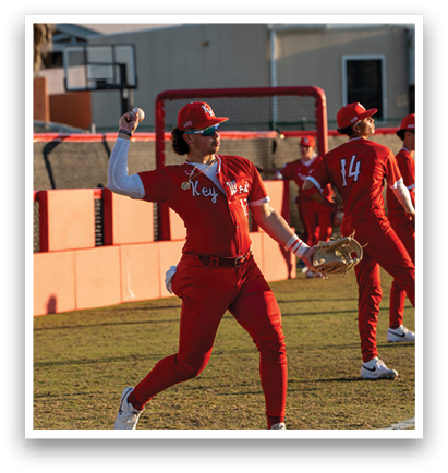 A baseball player in a red uniform is throwing a ball. AI generated content