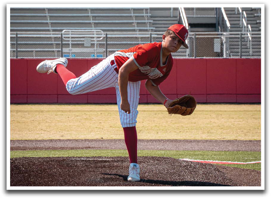 A baseball player in a red and white uniform is in the process of throwing a ball. AI generated content
